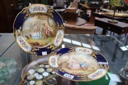 A PAIR OF ANTIQUE FRENCH SEVRES CABINET PLATES