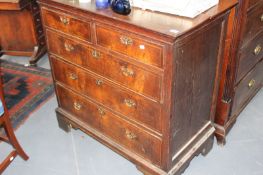 AN EARLY 18TH.C.OAK AND WALNUT INLAID CHEST OF DRAWERS