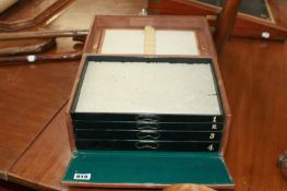 A LEATHER BOUND FOUR DRAWER FLY FISHING CASE