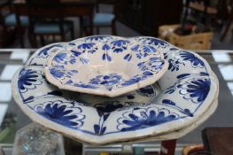 THREE ANTIQUE BLUE AND WHITE DELFT LOBED FORM DISHES
