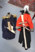 TWO CIVIL UNIFORMS, OF LORD LIEUTENANT TYPE, COMPRISING ONE RED TUNIC WITH CLOVER LEAF BULLION TRIM,