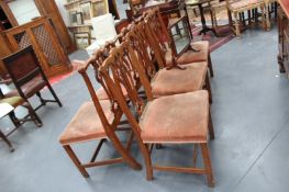 A SET OF SIX GEORGIAN PIERCED SPLAT BACK DINING CHAIRS