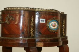 A MAHOGANY AND KINGWOOD JARDINIERE WITH GILT BRONZE AND PORCELAIN MOUNTS