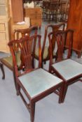 A PAIR OF QUEEN ANNE STYLE SIDE CHAIRS AND A PAIR OF GEORGIAN STYLE MAHOGANY SIDE CHAIRS