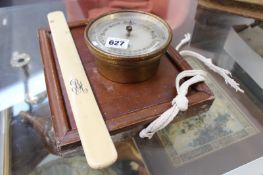 A MAHOGANY CASED CAMPAIGN MIRROR, AN IVORY PAGE TURNER AND AN ANEROID BAROMETER