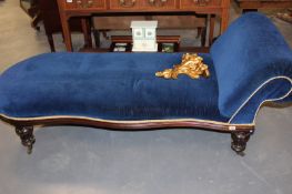 A VICTORIAN CARVED MAHOGANY FRAMED DAY BED