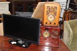 A SAMSUNG FLATSCREEN TV AND TWO VINTAGE STYLE RADIOS