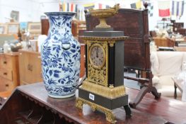 A 19TH.C.ORMALU MOUNTED STRIKING MANTLE CLOCK