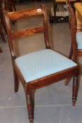 A SET OF FOUR REGENCY MAHOGANY SIDE CHAIRS