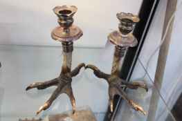 A PAIR OF EDWARDIAN SILVER MOUNTED CANDLESTICKS BY THE ARMY AND NAVY CO-OPERATIVE SOCIETY LIMITED