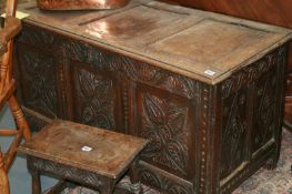 AN 18TH.C.CARVED FRONT OAK PANELLED COFFER