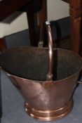 A LARGE COPPER COAL SCUTTLE