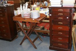 A PAIR OF LATE VICTORIAN MAHOGANY WELLINGTON CHESTS