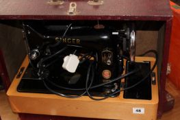 A SINGER SEWING MACHINE