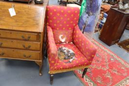 A 19TH.C.BERGERE LIBRARY ARMCHAIR AND A SIMILAR PERIOD UPHOLSTERED ARMCHAIR