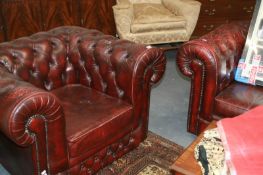 A BUTTON BACK LEATHER CHESTERFIELD SOFA AND ARMCHAIR