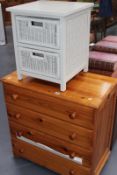 A SMALL PINE CHEST OF DRAWERS AND A TWO DRAWER BASKET CHEST