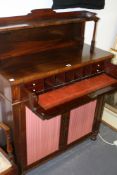A REGENCY ROSEWOOD SECRETAIRE CHIFFONIER WITH FITTED WRITING DRAWER