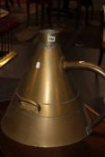 A VINTAGE BRASS FOUR GALLON CUSTOM`S FUEL MEASURE