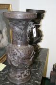 A PAIR OF LARGE ANTIQUE JAPANESE BRONZE VASES, THE NECKS ENCIRCLED WITH WRITHING DRAGONS, THE BODIES