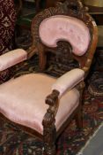 A VICTORIAN CARVED SHOW FRAME ARMCHAIR