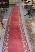 AN ANTIQUE INDO PERSIAN RUNNER. 694 X 79 CMS