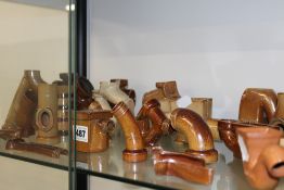 AN UNUSUAL EXTENSIVE MINIATURE DOULTON COLLECTION OF PLUMBING FITMENTS, PROBABLY SALESMAN SAMPLES