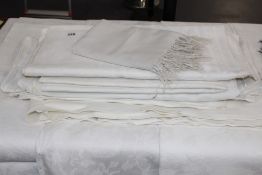 A COLLECTION OF VARIOUS DAMASK TABLECLOTHS.