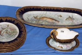 A LIMOGES HAND PAINTED PART DINNER SERVICE DECORATED WITH FISH