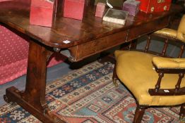 A VICTORIAN ROSEWOOD LIBRARY WRITING TABLE