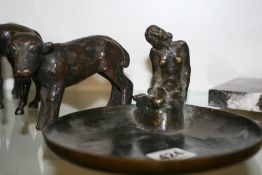 TWO ART DECO BRONZE FIGURES, A SEATED MAIDEN AND A CALF