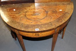 A GEORGIAN MAHOGANY CROSS BANDED AND INLAID FOLD OVER CARD TABLE TOGETHER WITH A SIMILAR FOLD OVER