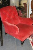 A VICTORIAN HOWARD STYLE DEEP SEAT ARMCHAIR