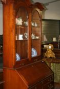 AN EARLY GEORGIAN STYLE FRUITWOOD BUREAU BOOKCASE