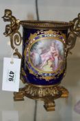 AN ORMOLU MOUNTED SEVRES CACHE POT, JEWELLED AND GILT FRAMED FIGURAL PANELS, ON A DARK BLUE GROUND