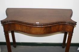 AN EARLY 20TH.C.CHIPPENDALE STYLE SERPENTINE CARD TABLE