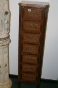 A FRENCH MAHOGANY AND MARQUETRY INLAID SEVEN DRAWER TALL CHEST