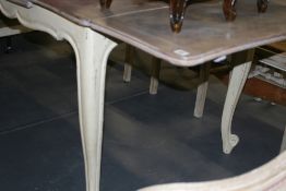 A FRENCH STYLE PAINTED DRAW LEAF DINING TABLE