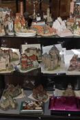 AN EXTENSIVE COLLECTION OF DAVID WINTER AND JOHN PINE STUDIOS POTTERY COTTAGES AND CASTLES