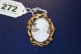 A GOLD MOUNTED CAMEO BROOCH