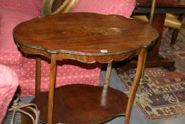 A CONTINENTAL INLAID AND BRASS MOUNTED TWO TIER OCCASIONAL TABLE