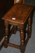 AN OAK JOINT STOOL