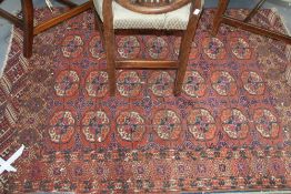 AN ANTIQUE TEKKE BOKHARA RUG. 156 X 122 CMS