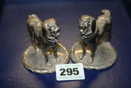 A PAIR OF GARRARD SILVER DESK PAPERWEIGHTS IN THE FORM OF DOGS