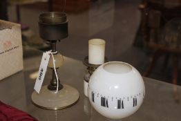 AN UNUSUAL 19TH.C. OIL LAMP CLOCK