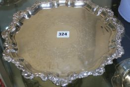 A LARGE ELKINGTON HALLMARKED SILVER TRAY ON THREE SHAPED FEET.