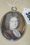 A GEORGIAN OVAL MINIATURE PORTRAIT OF A GENTLEMAN. WATERCOLOUR. WHITE METAL FRAME. INSCRIBED ON