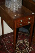 A GEORGIAN MAHOGANY AND CROSSBANDED DROP LEAF WORK TABLE