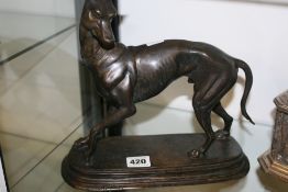 A BRONZE SCULPTURE OF A WHIPPET,SIGNED