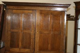 AN OAK SIDE CABINET